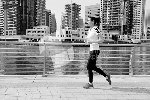 Image of woman jogging at morning