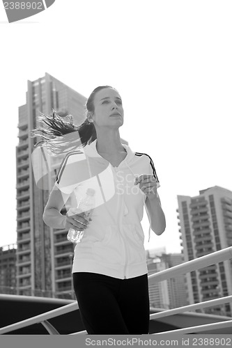 Image of woman jogging at morning