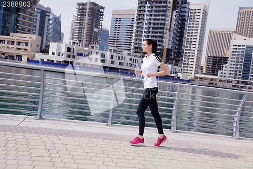 Image of woman jogging at morning