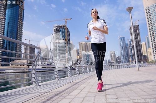 Image of woman jogging at morning