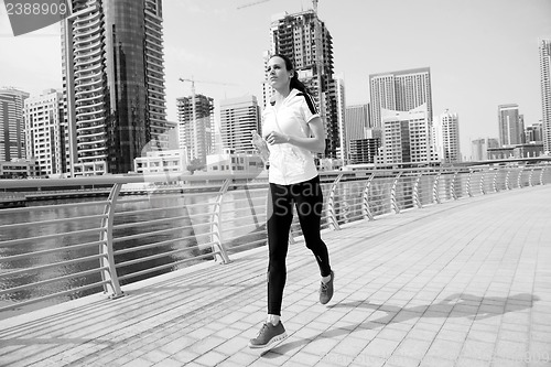 Image of woman jogging at morning