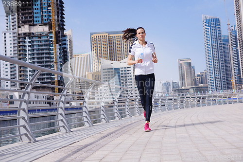 Image of woman jogging at morning