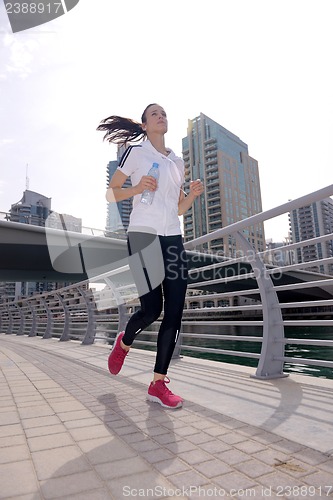 Image of woman jogging at morning