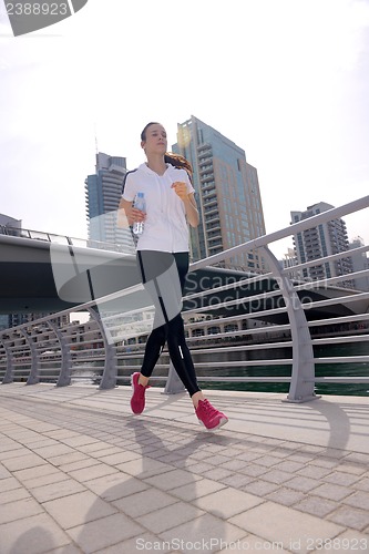 Image of woman jogging at morning