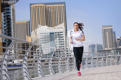 Image of woman jogging at morning