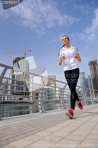 Image of woman jogging at morning