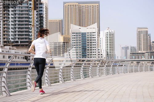 Image of woman jogging at morning