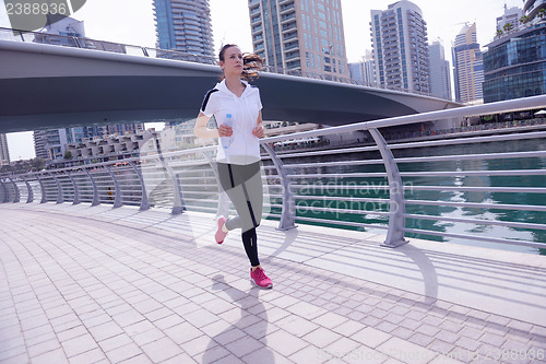 Image of woman jogging at morning