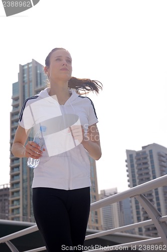 Image of woman jogging at morning