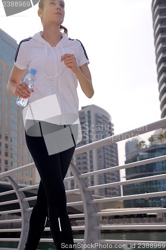 Image of woman jogging at morning