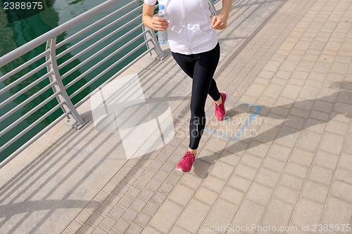 Image of woman jogging at morning