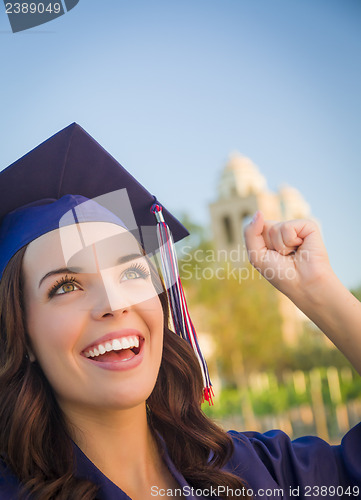 Image of Happy Graduating Mixed Race Woman In Cap and Gown