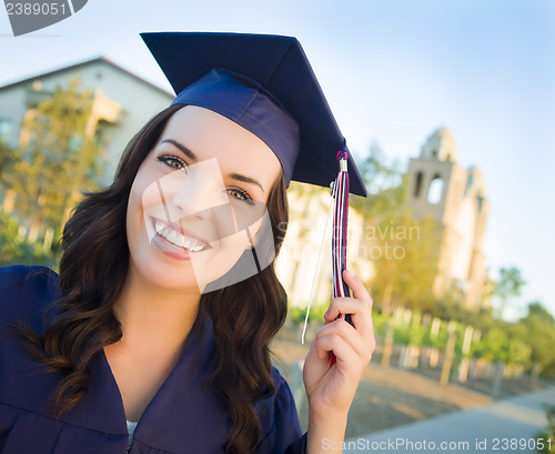 Image of Happy Graduating Mixed Race Woman In Cap and Gown