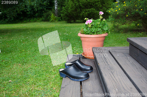 Image of Clogs at a stair