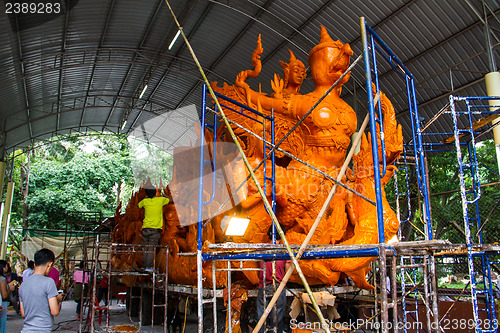 Image of UBONRATCHATHANI, THAILAND - JULY 23: Candles are carved out of w