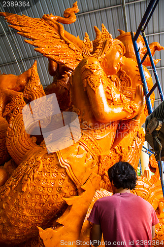 Image of UBONRATCHATHANI, THAILAND - JULY 23: Candles are carved out of w