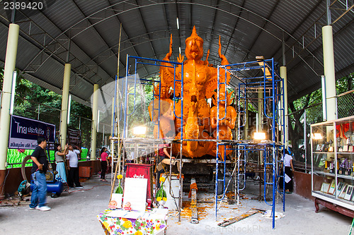 Image of UBONRATCHATHANI, THAILAND - JULY 23: Candles are carved out of w