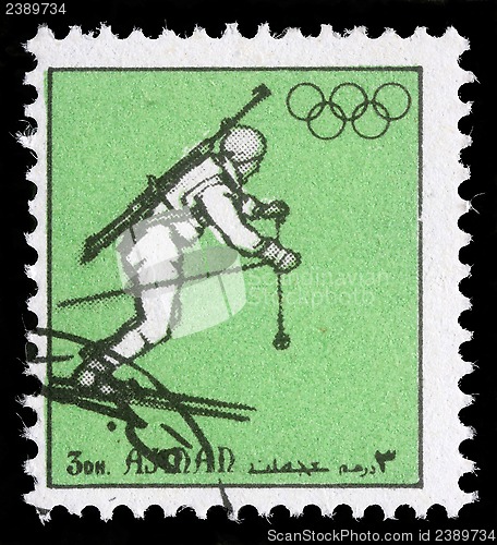 Image of Stamp printed in Ajman shows biathlonist