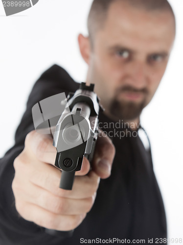 Image of Man with gun, gangster