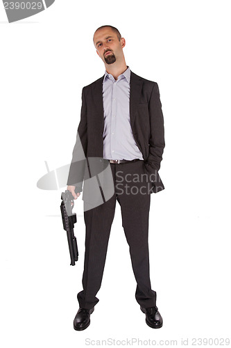 Image of Mafia man is holding a shotgun