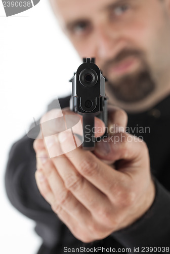 Image of Man with gun, gangster