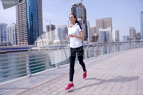 Image of woman jogging at morning