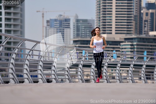 Image of woman jogging at morning