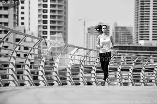 Image of woman jogging at morning
