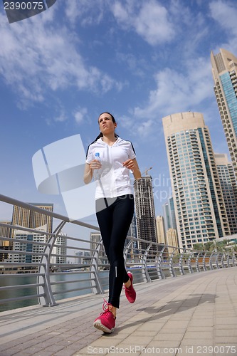Image of woman jogging at morning