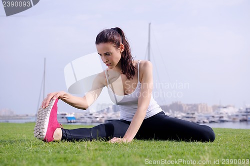 Image of Young beautiful  woman jogging  on morning