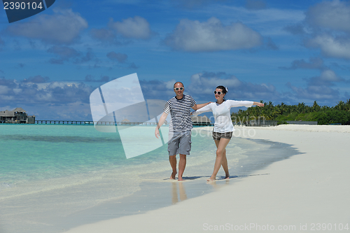 Image of happy young couple have fun on summer