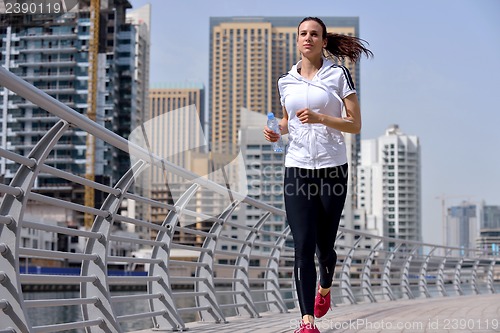 Image of woman jogging at morning