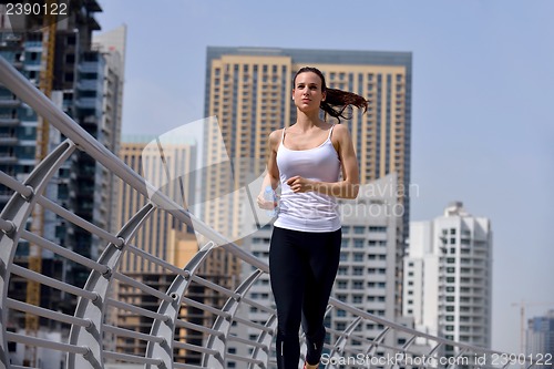 Image of woman jogging at morning