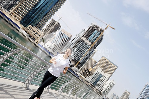 Image of woman jogging at morning