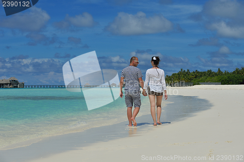 Image of happy young couple have fun on summer