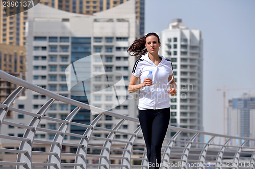 Image of woman jogging at morning