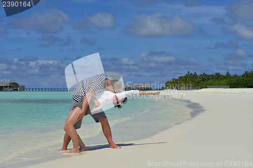 Image of happy young couple have fun on summer