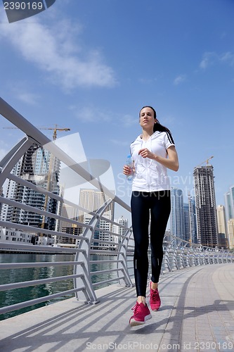 Image of woman jogging at morning