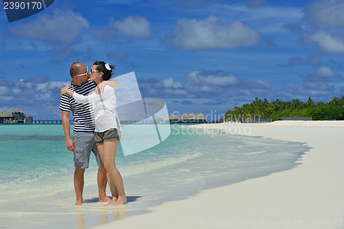 Image of happy young couple have fun on summer