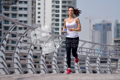 Image of woman jogging at morning