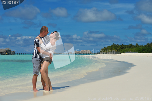 Image of happy young couple have fun on summer