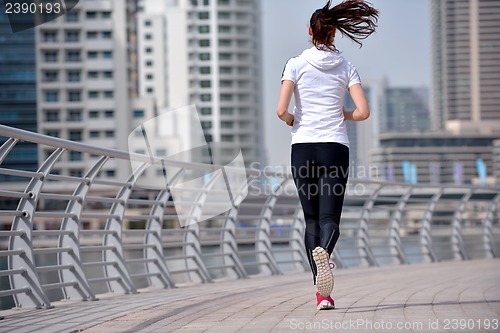 Image of woman jogging at morning