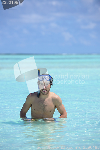 Image of young guy with diving mask