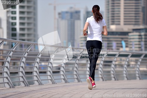 Image of woman jogging at morning