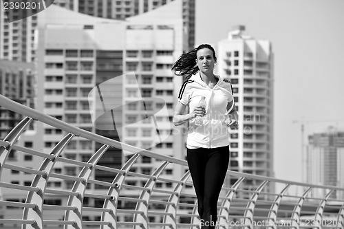 Image of woman jogging at morning