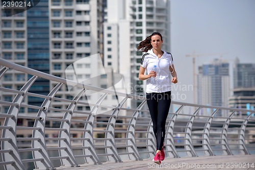 Image of woman jogging at morning