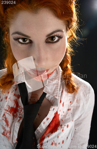 Image of schoolgirl with blood all over