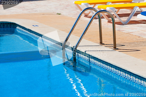 Image of Ladder in the swimming pool