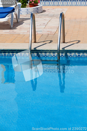 Image of Ladder in the swimming pool