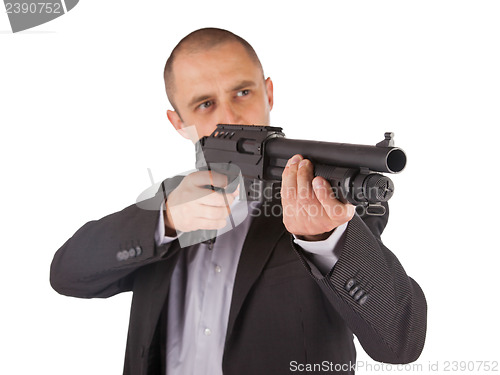 Image of Mafia man is holding a shotgun